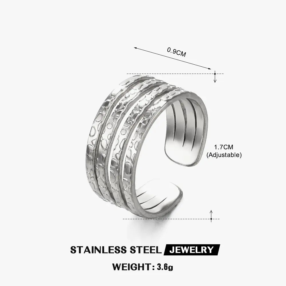Lumina Wire | Sculptural Wrap Ring in 18K Gold & Industrial Steel