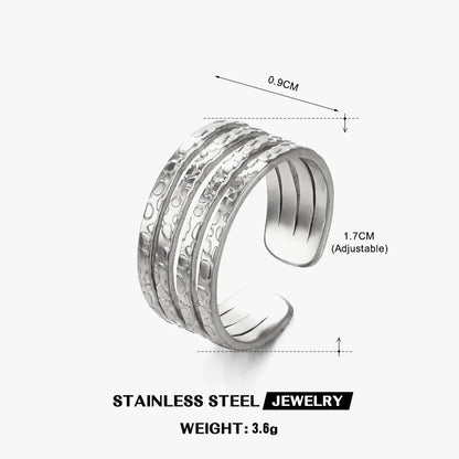 Lumina Wire | Sculptural Wrap Ring in 18K Gold & Industrial Steel